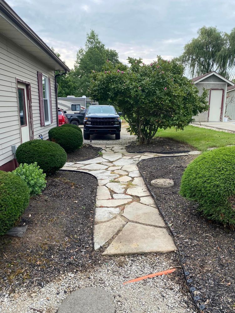 Our Shrub Trimming service ensures your bushes are professionally shaped and maintained to enhance the beauty of your landscape, improving curb appeal and creating a welcoming outdoor environment for you. for OT Lawn and Landscaping LLC in Carey, OH