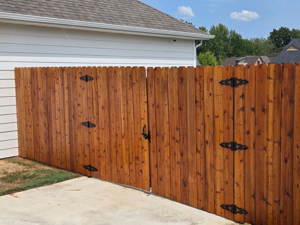 Fence staining for Patriot Fence  in Oakland, TN