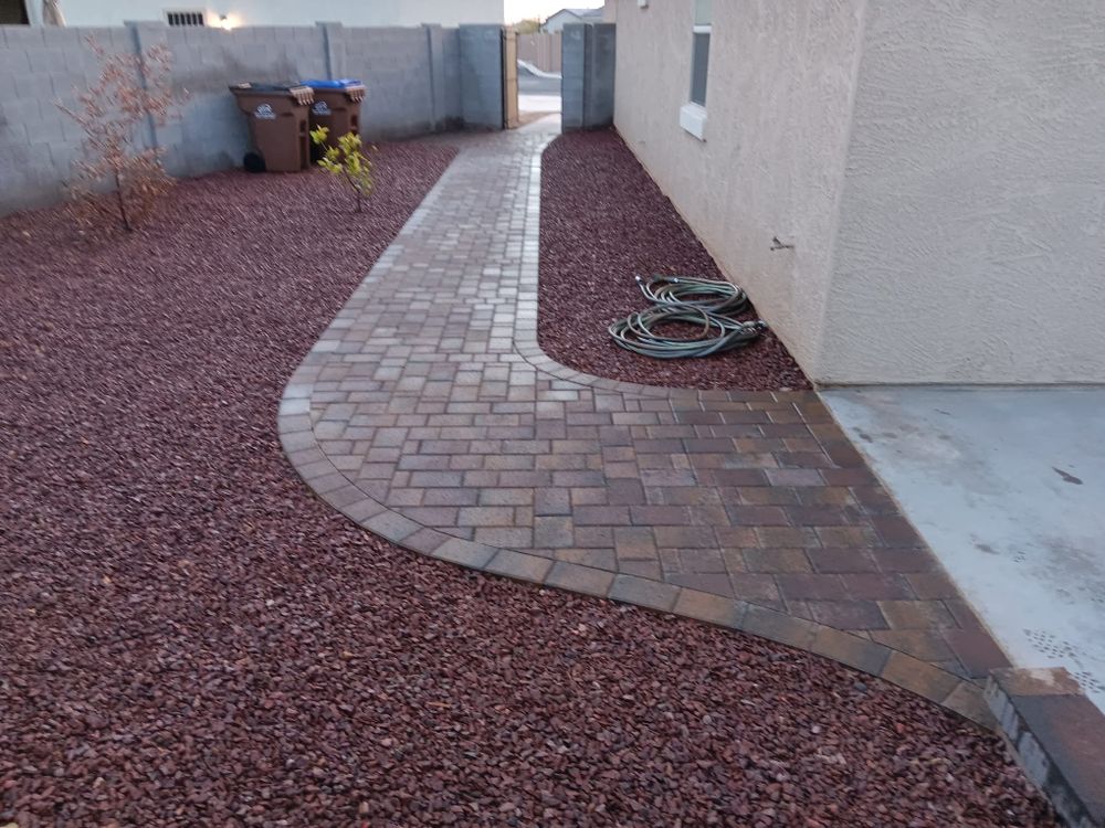 Transform your outdoor space with our expert paver installation services, providing durability and aesthetic appeal. Enhance driveways, patios, and walkways with custom designs tailored to your unique landscape vision. for Green landscape in Chandler, AZ