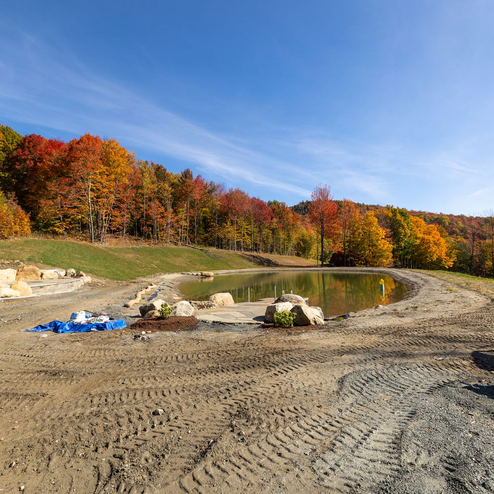 Carving a Pond into a Mountain Side for Andy Naylor Excavation in Stowe, VT