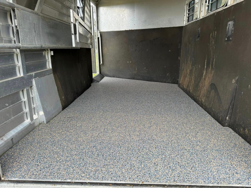 Equiflex Flooring is a porous rubber floor with binders specifically designed to withstand wear and tear from ALL livestock. If your ready to freshen up your trailer and get rid of those heavy black mats let us know! Not only does it allow your animals not to stand in urine all day but it also gives them extra cushion to ride on for those long trips! Slip resistant and shock absorbing too! Message us today for your quote for Shelton Trailer Flooring  in Ocala, FL