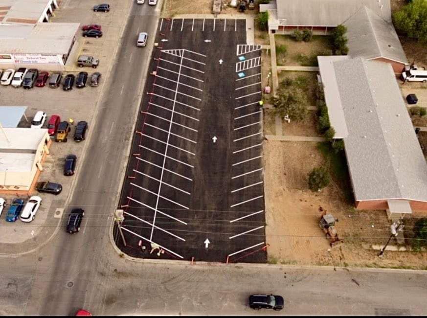 Our Parking Lots service offers homeowners professional asphalt paving solutions for their driveways, ensuring durability and aesthetic appeal while enhancing the overall value and functionality of their property. for RRR Sealcoat & Striping in Laredo, TX