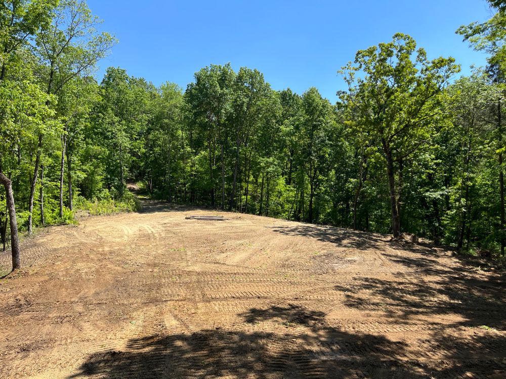 Our Land Clearing service efficiently removes trees, brush, and debris from your property to prepare it for construction or landscaping projects, ensuring a clean and cleared space for your desired project. for Collins Constructors in Fyffe, AL