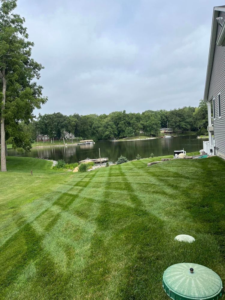 Our professional mowing service provides homeowners with regular maintenance to keep their lawn looking neat and well-manicured. Let us handle the hard work so you can enjoy your outdoor space. for Hatalla Lawn Maintenance  in Springfield, IL