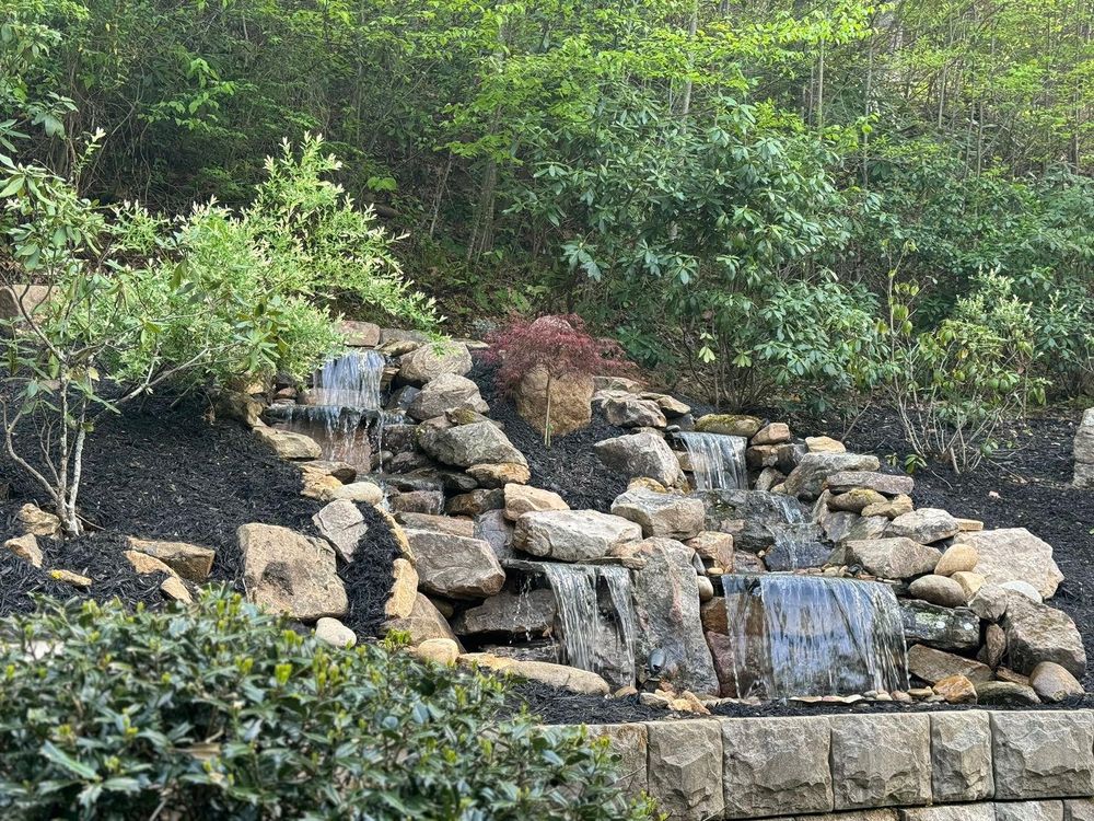 Transform your outdoor space with our expert Water Features service, enhancing aesthetics and tranquility. From elegant fountains to serene ponds, we craft personalized installations that elevate your home's exterior appeal. for Outdoor Assassins LLC in Hendersonville, NC