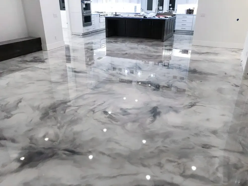 Transform your home's floors with our Metallic Epoxy service, offering a stunning blend of durability and unique visual appeal, creating luxurious, custom designs that enhance any interior space. for Brothers Coatings and Painting LLC in Holly Ridge, NC