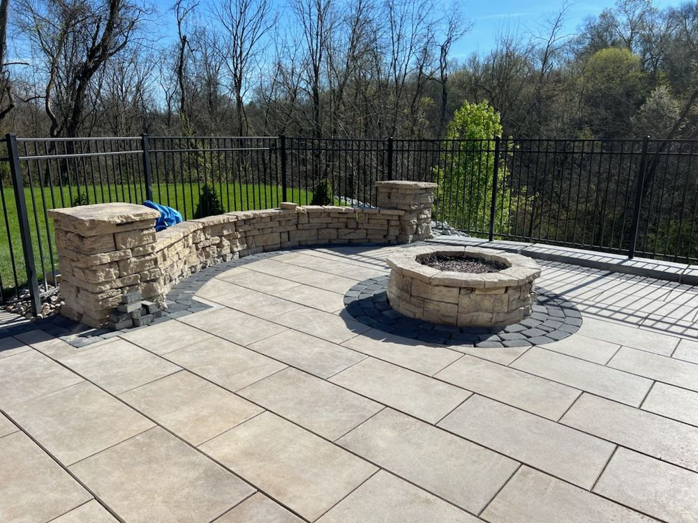 Enhance your outdoor living space with our expert fire pit and fireplace installations, providing warmth, style, and a perfect gathering spot for friends and family in your backyard. for Henney’s Custom Hardscapes in Canonsburg, PA