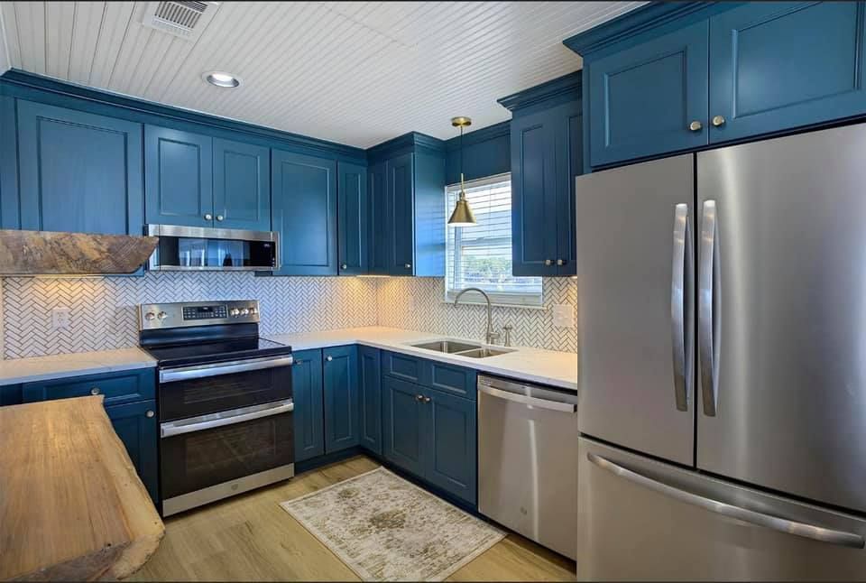 Transform your home with our Kitchen and Cabinet Refinishing service, offering expert craftsmanship that revitalizes old cabinets with a fresh, stylish finish. Enhance durability and upgrade aesthetics without the cost of replacement. for Laser Line Painting in Dover, TN