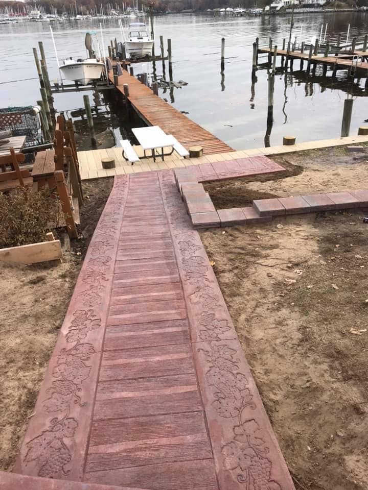 Our Retaining Wall Construction service expertly designs and builds durable, attractive walls that enhance landscape stability while adding aesthetic appeal to your property, ensuring safety and increasing home value. for STORY & Associates in Annapolis, MD