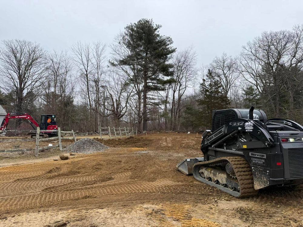 Our sitework service prepares your land for construction by grading, clearing debris, and ensuring proper drainage, creating a stable foundation for your project while enhancing the safety and longevity of the structure. for Triple C’s Excavation in Ashford, CT