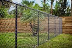 Enhance your property's security and aesthetics with our top-quality chain link fencing. Durable and cost-effective solutions for privacy and protection that seamlessly blend into any landscape. Expert installation guaranteed. for Pine Mountain Restoration in Howard, PA