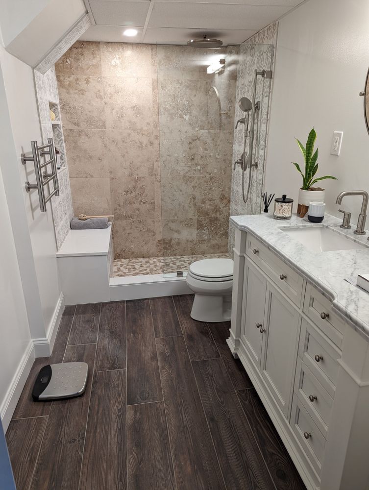 Our professional bathroom renovation service transforms your space with expert design, quality materials, and skilled craftsmanship, ensuring a seamless process that enhances both functionality and aesthetic appeal. for SNL Contractor in Windham Country, CT