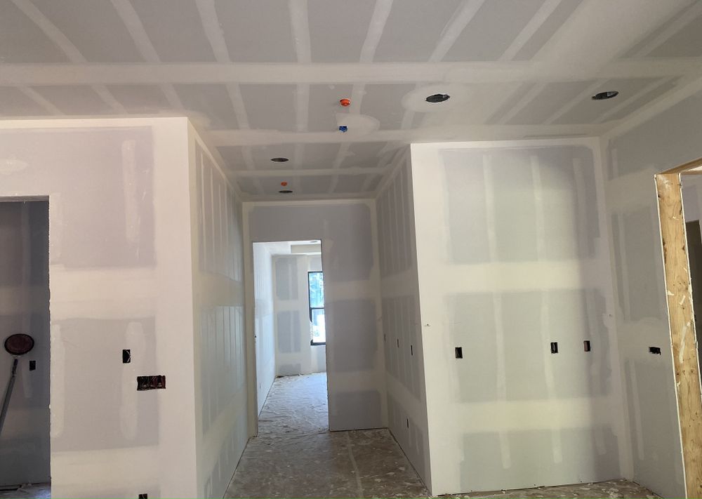 Our professional drywall finishing service ensures a smooth and seamless surface for your walls, enhancing the overall look of your home during the construction or remodeling process. for MLKD Drywall in Everett, WA