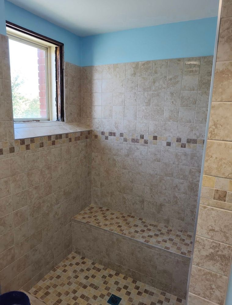 Transform your bathroom into a modern oasis with our expert renovation services, ensuring quality craftsmanship and innovative design that enhances functionality, maximizes space, and reflects your personal style. for Oasis Contracting in New Richmond, OH