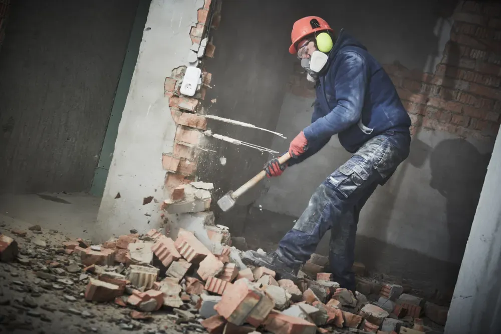 Our Demolition service safely and efficiently removes unwanted structures, preparing your outdoor space for new landscaping projects. Trust our expert team to clear debris while ensuring minimal disruption to your property. for Happy Jack's Junk Removal in Abington, MA
