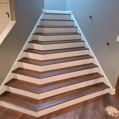 Enhance your home's aesthetic with our Floor Covering Stairs service, providing expert installation of durable and stylish materials tailored to fit your stairs perfectly, combining elegance with functionality for a seamless finish. for Big T Floors in Mercer County, NJ