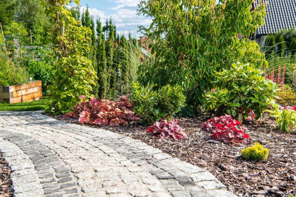 Enhance your garden's beauty with our Flowerbed Maintenance service, offering expert care in planting, pruning, and weeding to ensure vibrant blooms and a stunning landscape year-round for your home. for Picano Landscaping in Reading, MA