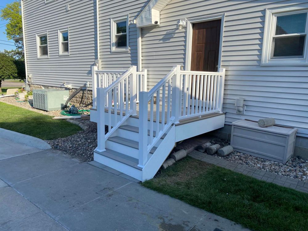 Transform your outdoor space with our professional Deck & Patio Installation service. Our experienced team will work closely with you to create a beautiful and functional area for relaxation and entertainment. for Lara Construction in Norfolk, NE