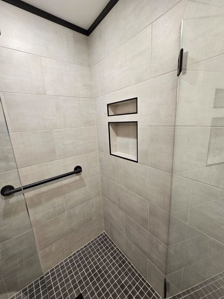 Our expert tiling service transforms your home with precision and style, enhancing any space. From kitchens to bathrooms, we provide high-quality tile installation tailored to your unique vision and needs. for Kearns Construction in Cadillac, MI