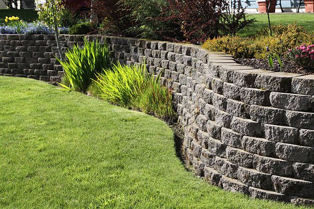 Our Retaining Walls service provides durable and aesthetically pleasing solutions, enhancing your landscape's stability while complementing its design. Trust our expertise to seamlessly integrate functionality with visual appeal in every project. for A Plus Demolitions Services in Pittsburgh, PA