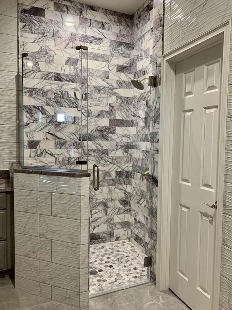 Transform your bathroom with our expert tiling service, offering precision installation, a wide range of styles and materials, and attention to detail for a beautiful and durable finish. for Paul Dooley Stone and Tile Art in Orlando, FL