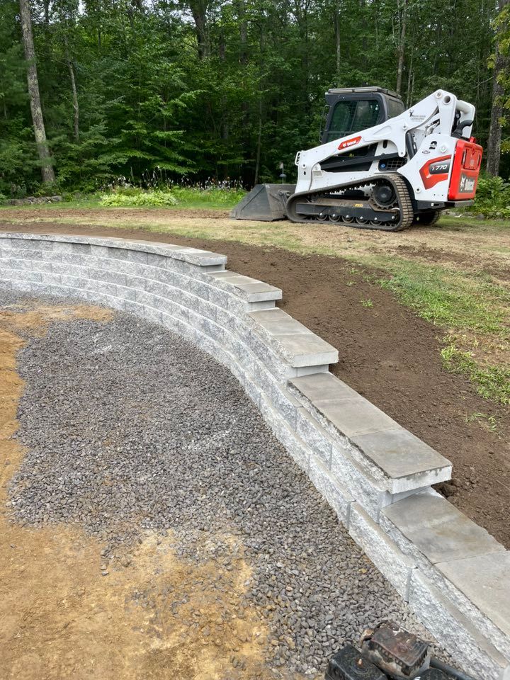 Enhance your home's entrance with our expert granite step construction services, offering durability and elegance for a timeless appeal. Trust our skilled team to create stunning steps that elevate your landscape. for Deering Ridge Landscaping in Waterboro, ME
