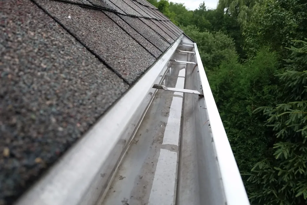 Our Gutter Cleaning service ensures clean and debris-free gutters, protecting your home from potential damage caused by clogged gutters. for Foreshore Pressure Cleaning Services Inc in Holiday, FL