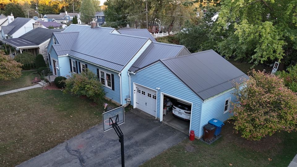 Enhance your home's curb appeal and durability with our premium vinyl siding services. Our skilled team ensures a seamless installation, offering long-lasting protection against weather elements while boosting your property's aesthetic value. for Richards Roofing & Construction in Logansport, IN