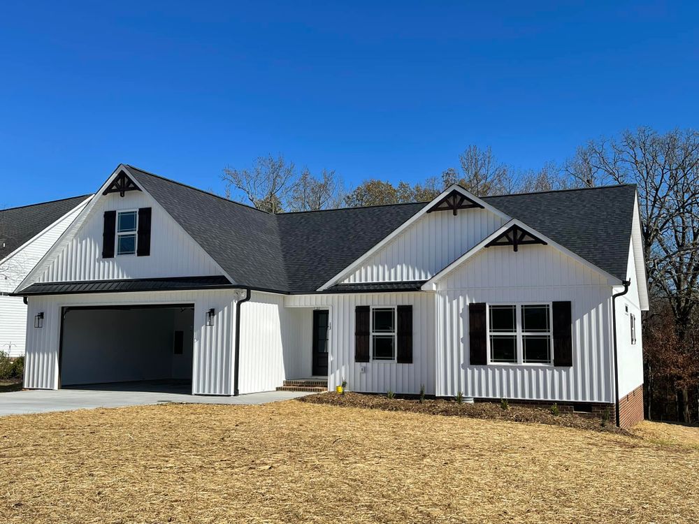 Our custom home construction service offers personalized design and expert craftsmanship to create your dream home, ensuring every detail reflects your unique vision and meets the highest quality standards. for Hughes Builders LLC in Greensboro, NC