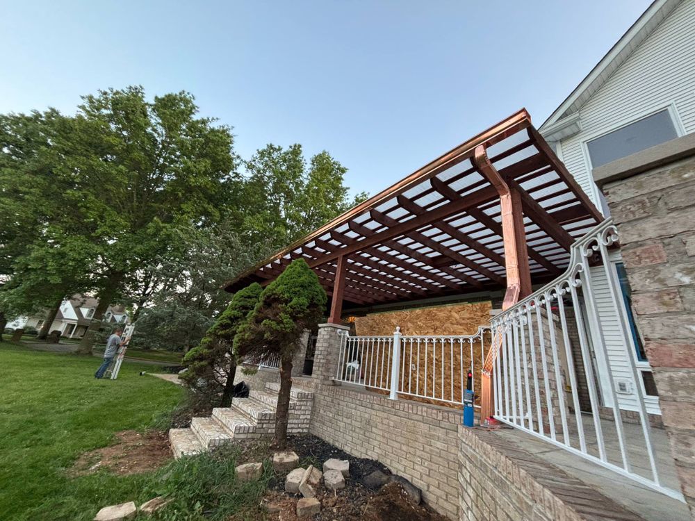 Transform your outdoor living space with our expert pergola installation service, offering custom designs and durable construction to enhance your home's beauty and provide a comfortable area for relaxation or entertainment. for KY Gutter Pro & Specialty Roofing Systems in Monticello, KY