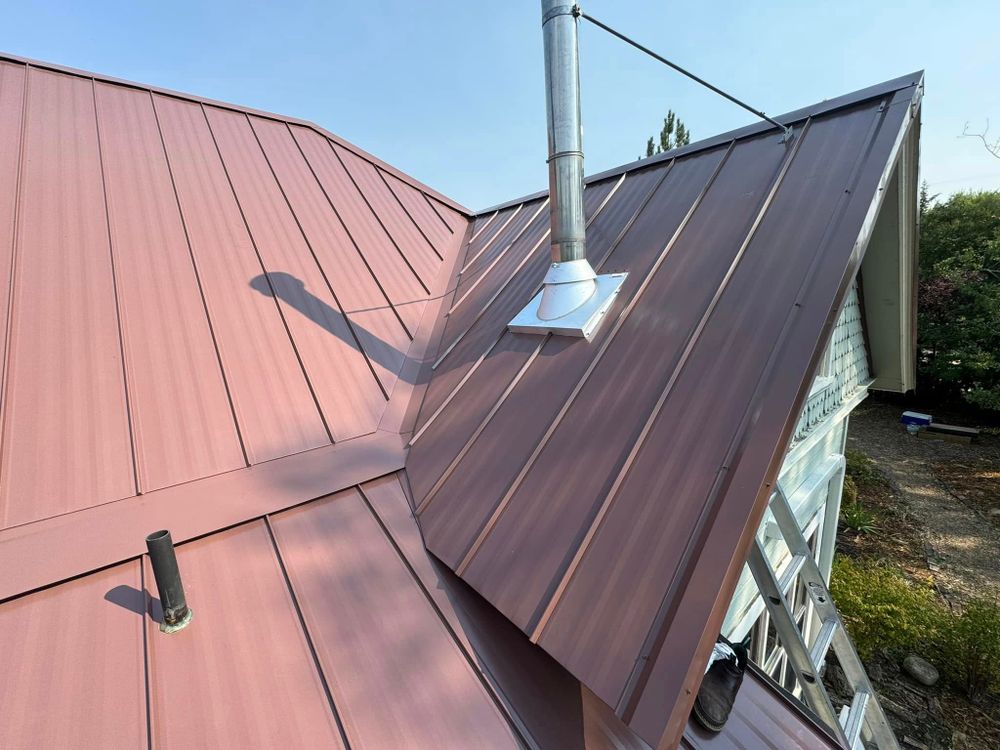 Our expert roofing service offers durable, energy-efficient metal roofing solutions that enhance your home's curb appeal, providing exceptional protection and longevity while minimizing maintenance needs for a worry-free investment. for Djg Construction in Wallowa, OR