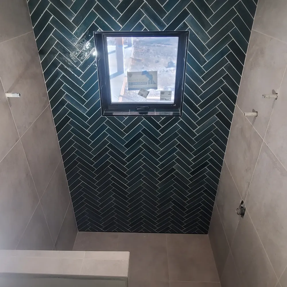 Herringbone shower for Elite Tile in La Grande, OR