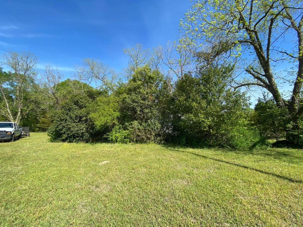 Our professional mowing service delivers a crisp, well-manicured lawn, enhancing your property's curb appeal with precision cutting, edging, and trimming to ensure your landscape looks immaculate year-round. for S&S Lawn and Home Services in Dublin, GA