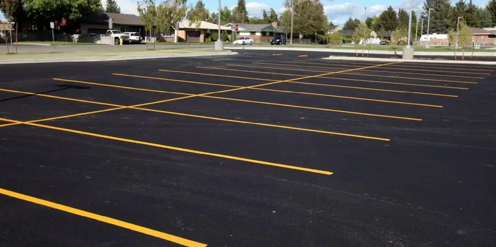 Our Asphalt Parking Lot Construction service provides homeowners with durable, smooth surfaces designed for increased longevity and aesthetic appeal, ensuring quality craftsmanship and efficient installation to enhance your property's value and functionality. for Warwick Paving in Lititz, PA