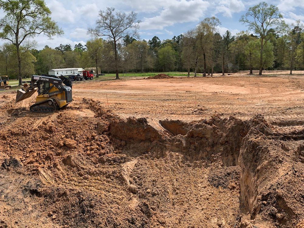 Our Dirt Work service ensures precise excavation and grading for your project, providing a solid foundation while enhancing drainage and landscape aesthetics to transform your outdoor spaces efficiently and professionally. for Black Diamond Construction and Services in Lubbock, TX