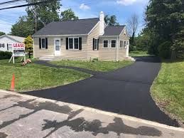 Our Asphalt Maintenance service prolongs the life of your driveway by addressing cracks and seal coating, ensuring a smooth surface while enhancing curb appeal and protecting against weather-related damage. for Custom Paving in Savannah, GA