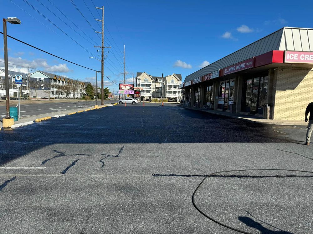 Our professional seal coating service enhances the appearance and longevity of your driveway by providing a protective layer that seals out water, oil, and UV damage for long-lasting durability. for O.C. Paving in Dagsboro, DE