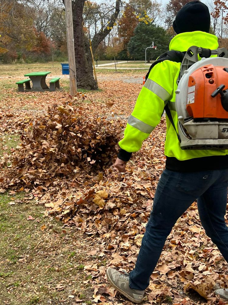 Our Fall Clean Up service ensures a pristine yard through leaf removal, debris cleanup, and plant care, preparing your landscape for winter while enhancing curb appeal and promoting healthy growth for spring. for JM Lawn and Landscape in Bella Vista, AR