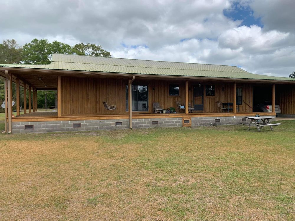 Enhance your home's water management with our professional gutter installation service. Our tree care experts also offer efficient mulch installation, ensuring a complete landscape solution for optimal drainage and plant health. for Dampier Screening in Bonifay, FL