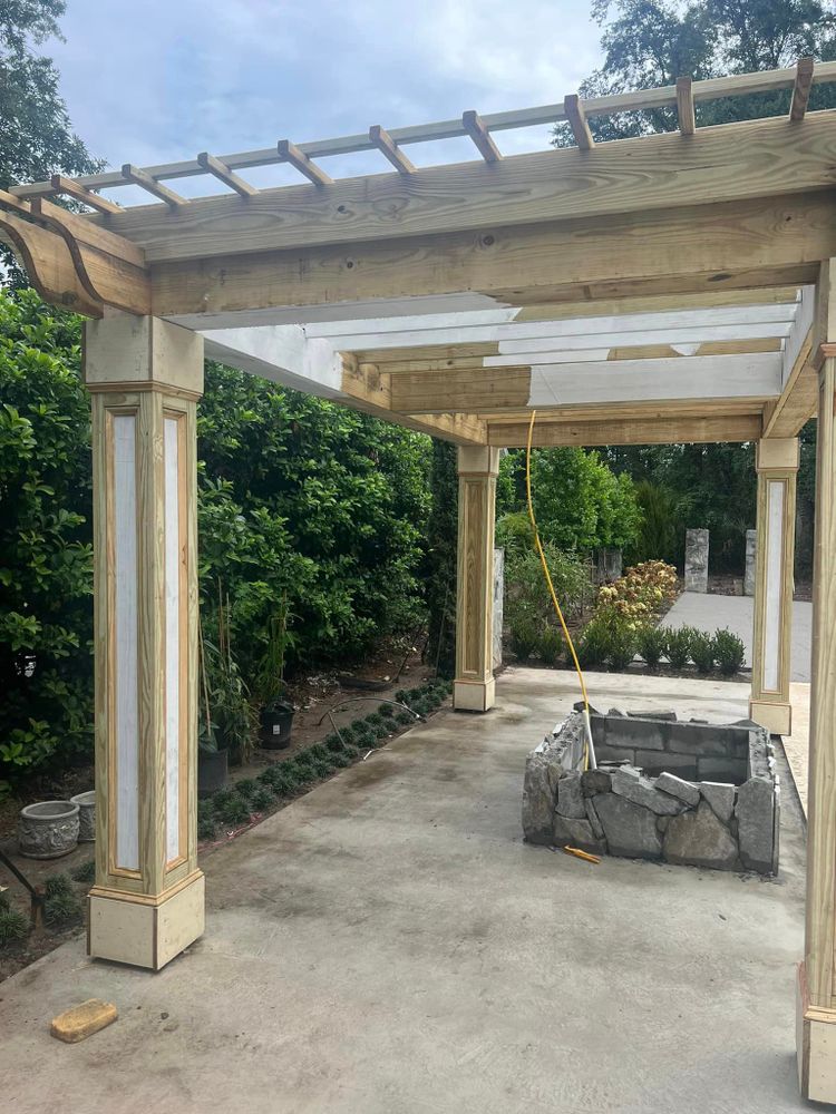 Transform your outdoor space with our custom Pergolas service. Enhance your home's aesthetic appeal and create a functional, stylish area perfect for relaxing or entertaining guests in comfort and style. for Cisne's LLC in Charleston, SC