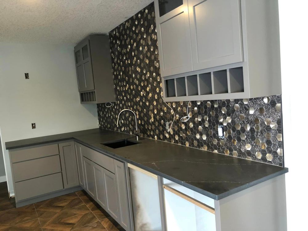 Transform your kitchen into a functional and stylish space with our expert renovation service. From custom cabinets to modern appliances, we'll bring your dream kitchen to life with precision and quality craftsmanship. for CSR Tile Construction in Fridley, MN