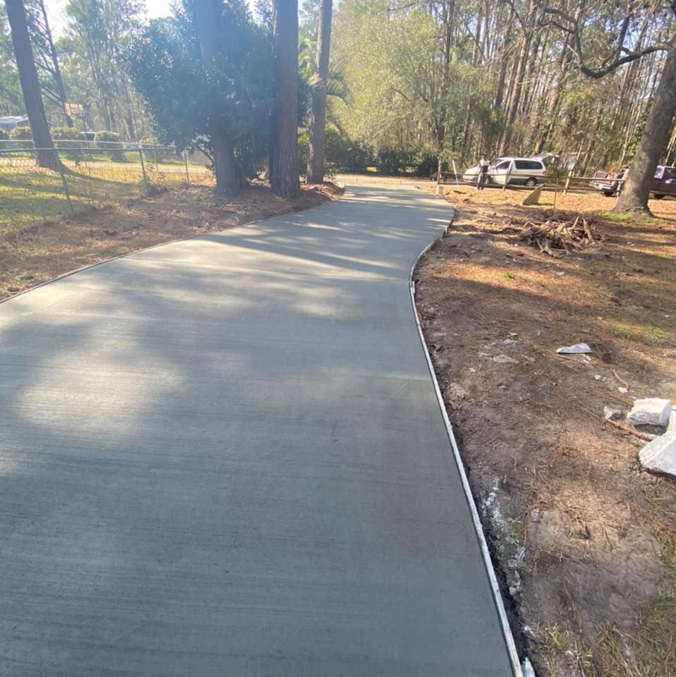 We offer professional sidewalk installation services to ensure your property looks great and is safe for walking. for Wallace Concrete in Ridgeland,  SC