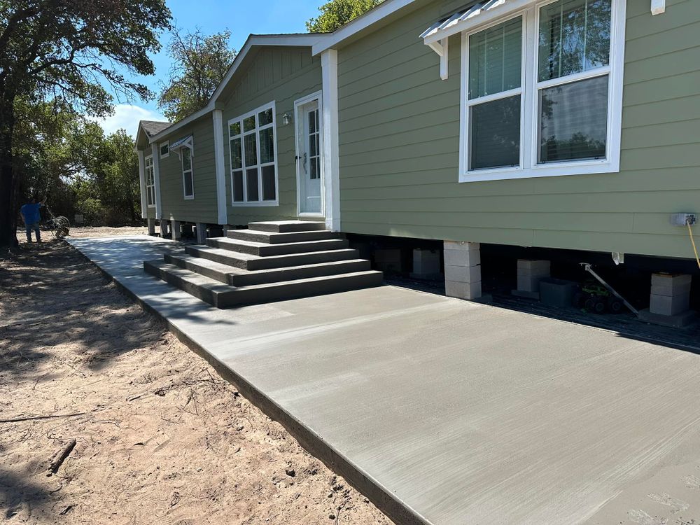 Our expert Step Installation service enhances your home's curb appeal with durable, custom-designed steps that blend seamlessly with your existing exterior, ensuring safety, functionality, and aesthetic charm for any entrance. for Ramos Masonry & Concrete Construction LLC in Clyde, TX