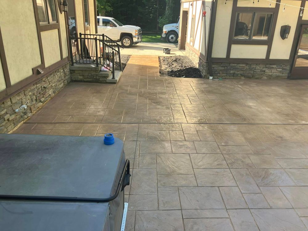 Enhance your outdoor space with our expert patio design and installation service, offering durable concrete solutions that are customized to fit your aesthetic and functional needs perfectly. Enjoy style and practicality combined. for Lake Erie Companies in Grand River, OH