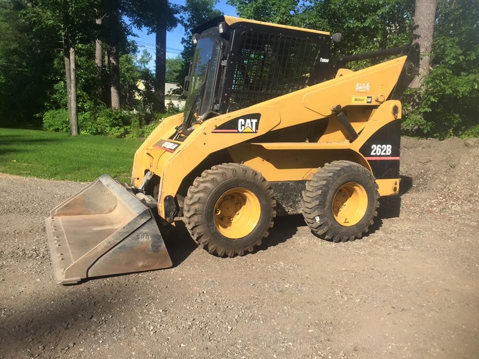Our Skid Steer Work service offers efficient and precise excavation, grading, and material handling to enhance your property. Ideal for landscaping projects or site preparations with minimal disruption to your space. for CM Smith Trucking in Townsend, MA