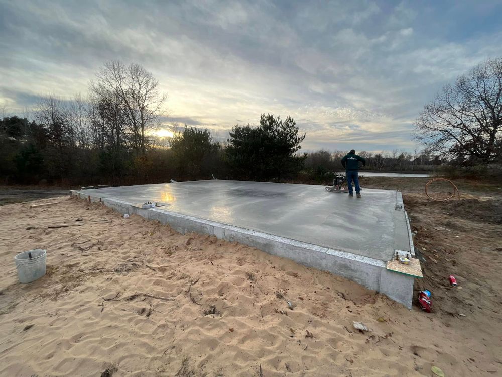 Our Concrete Slab Construction service offers durable, expertly crafted slabs for your home’s foundation, patios or driveways. We ensure strength, precision, and longevity while enhancing the overall appeal of your property. for JR Concrete in Cadillac, MI