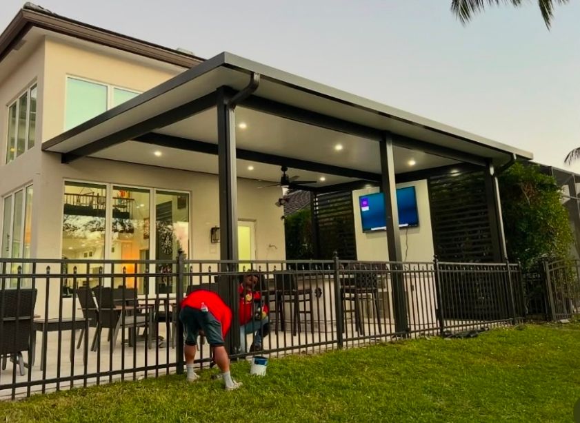 Enhance your outdoor space with our expertly crafted pergolas, offering both elegance and functionality. Our team designs personalized pergola solutions that transform any backyard into a beautiful retreat for relaxation and entertainment. for Beautiful and Affordable Stamped Concrete by Castilla Concrete Finish Design Corp in Sunrise, FL