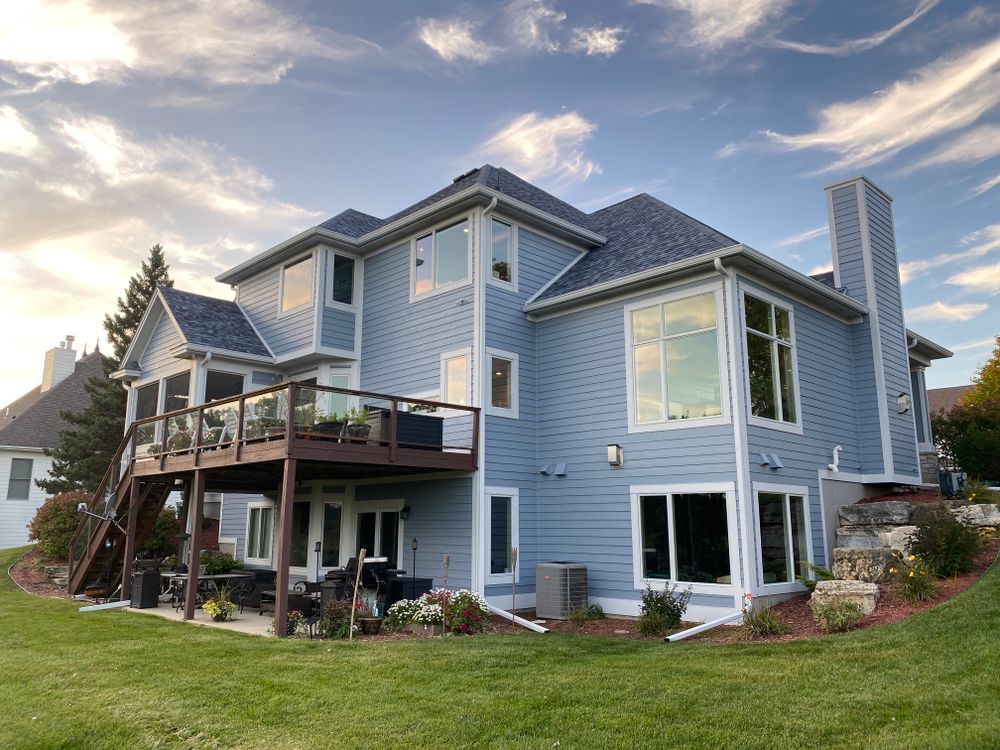 Transform your home's curb appeal with our expert exterior painting services. Our skilled team ensures superior quality, weather-resistant finishes that enhance beauty and provide long-lasting protection against the elements. for Hughberts Siding & Painting in Rochester, MN