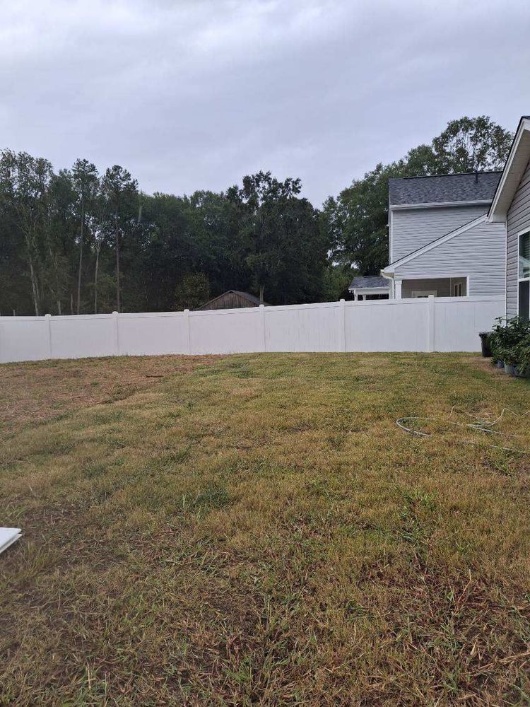 Enhance your home's outdoor appeal with our expert Fencing Repair & Installation services, seamlessly integrated into our deck & patio installation offerings, ensuring quality and durability for a beautiful and secure environment. for Rescue Construction in Marietta, SC