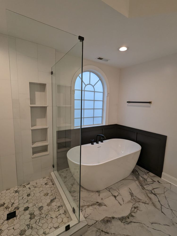 Transform your bathroom into a luxurious retreat with our expert renovation service. We ensure quality craftsmanship, personalized design, and efficient project management to bring your dream space to life. for Lake Norman Renovations in Mooresville, NC